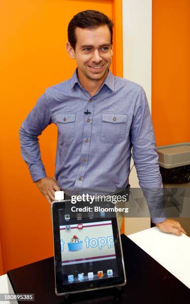 Jack Dorsey, co-founder and chairman of Twitter Inc. And co-founder and chief executive officer of Square Inc., stands for a photo following an...