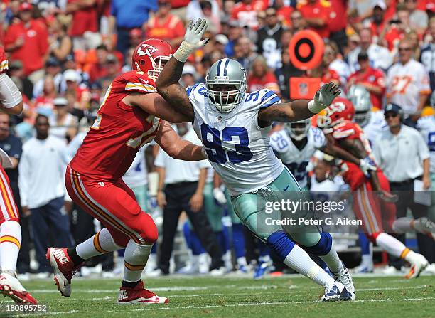 Defensive end Anthony Spencer of the Dallas Cowboys rushes around offensive tackle Eric Fisher of the Kansas City Chiefs during the first half on...
