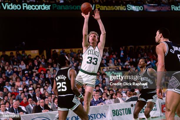 Larry Bird of the Boston Celtics shoots during a game against the San Antonio Spurs circa 1985 at the Boston Garden in Boston, Massachusetts. NOTE TO...