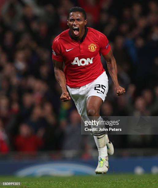Antonio Valencia of Manchester United celebrates scoring their fourth goal during the UEFA Champions League Group A match between Manchester United...
