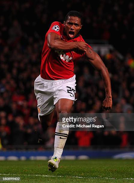 Antonio Valencia of Manchester United celebrates scoring his team's fourth goal during the UEFA Champions League Group A match between Manchester...