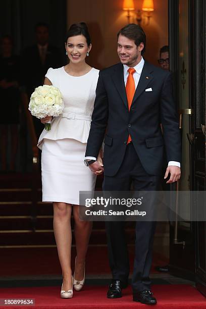 Prince Felix Of Luxembourg and Princess Claire of Luxembourg depart the villa after their Civil Wedding Ceremony at Villa Rothschild Kempinski on...