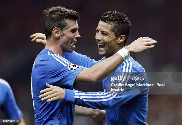 Cristiano Ronaldo of Real Madrid celebrates with Gareth Bale after scoring during the UEFA Champions League group B match between Galatasaray AS and...