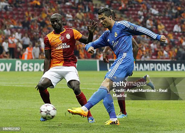 Cristiano Ronaldo of Real Madrid scores his team's sixth goal past Dany Nounkeu of Galatasaray AS during the UEFA Champions League group B match...