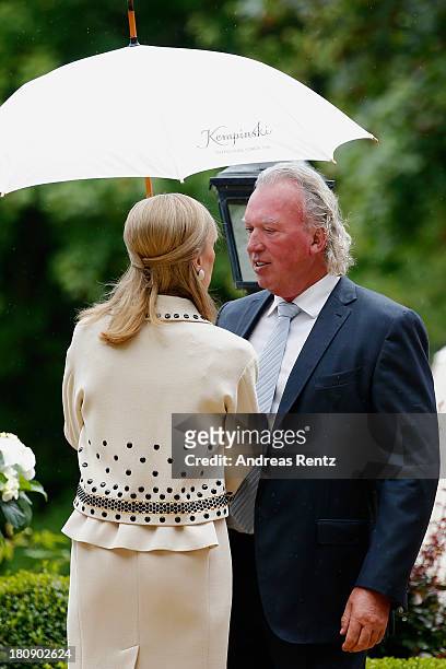 Hartmut Lademacher and Gabriele Lademacher-Schneider emerge from the villa after attending the Civil Wedding Of Prince Felix Of Luxembourg & Claire...