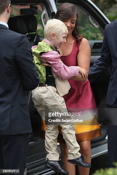 Prince Noah of Luxmebourg is being helped from the car by Princess Alexandra of Luxembourg as they arrive to the Civil Wedding Of Prince Felix Of...