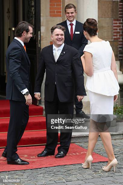 Prince Felix Of Luxembourg and Claire Lademacher are greeted by Mayor Leonhard Helm as they arrive to their Civil Wedding Ceremony at Villa...