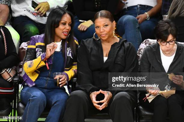 Eboni Nichols and Queen Latifah attend a basketball game between the Los Angeles Lakers and the Dallas Mavericks at Crypto.com Arena on November 22,...