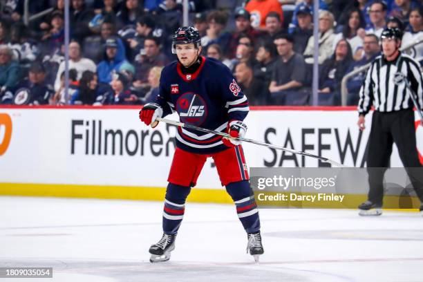 Cole Perfetti of the Winnipeg Jets keeps an eye on the play during third period action against the Buffalo Sabres at the Canada Life Centre on...