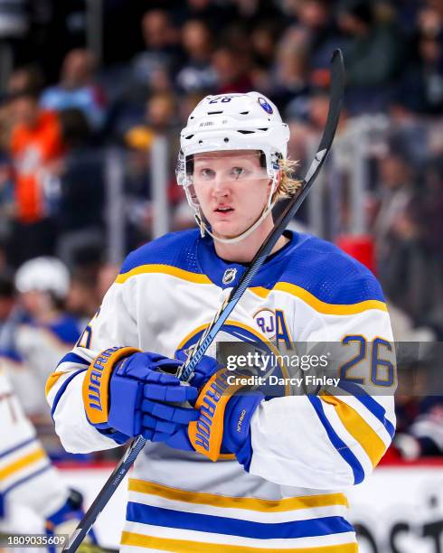 Rasmus Dahlin of the Buffalo Sabres looks on during a second period stoppage in play against the Winnipeg Jets at the Canada Life Centre on November...