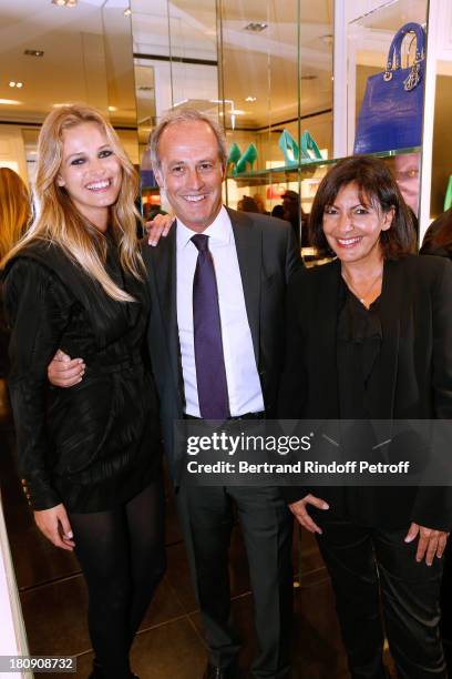 Model Edita, CEO of group Conde Nast France, Xavier Romatet and first assistant of mayor of Paris Anne Hidalgo attend 'Vogue Fashion Night Out 2013'...