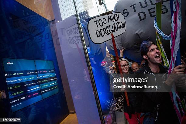 Occupy Wall Street protesters march from the United Nations building to Bryant Park on September 17, 2013 in New York City. The march centered around...
