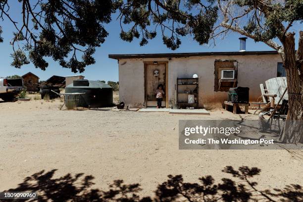 Tuba City, Arizona, July 6, 2023: HT stands by the doorway of his grandmother Laverna's house in family ranch in the Navajo Nation, Arizona, on...