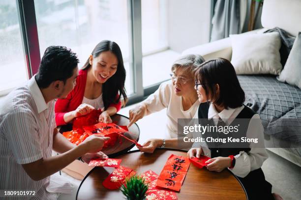 yeah~~chinese new year is coming. - 39 year old stockfoto's en -beelden