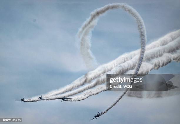 Aerobatic team performs at the opening ceremony of Aero Asia 2023 on November 23, 2023 in Zhuhai, Guangdong Province of China. The four-day Aero Asia...