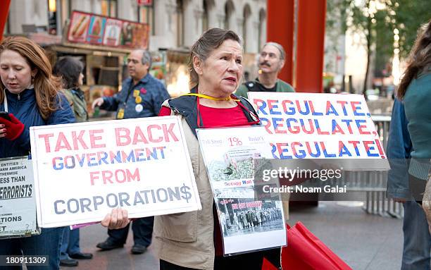 Protesters affiliated with Occupy Wall Street demonstrate for a variety of causes at Zuccotti Park near the New York Stock Exchange on the second...