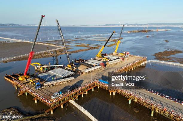 Aerial view of fishery-solar hybrid photovoltaic power plant under construction at Yueqing Bay on November 22, 2023 in Wenzhou, Zhejiang Province of...