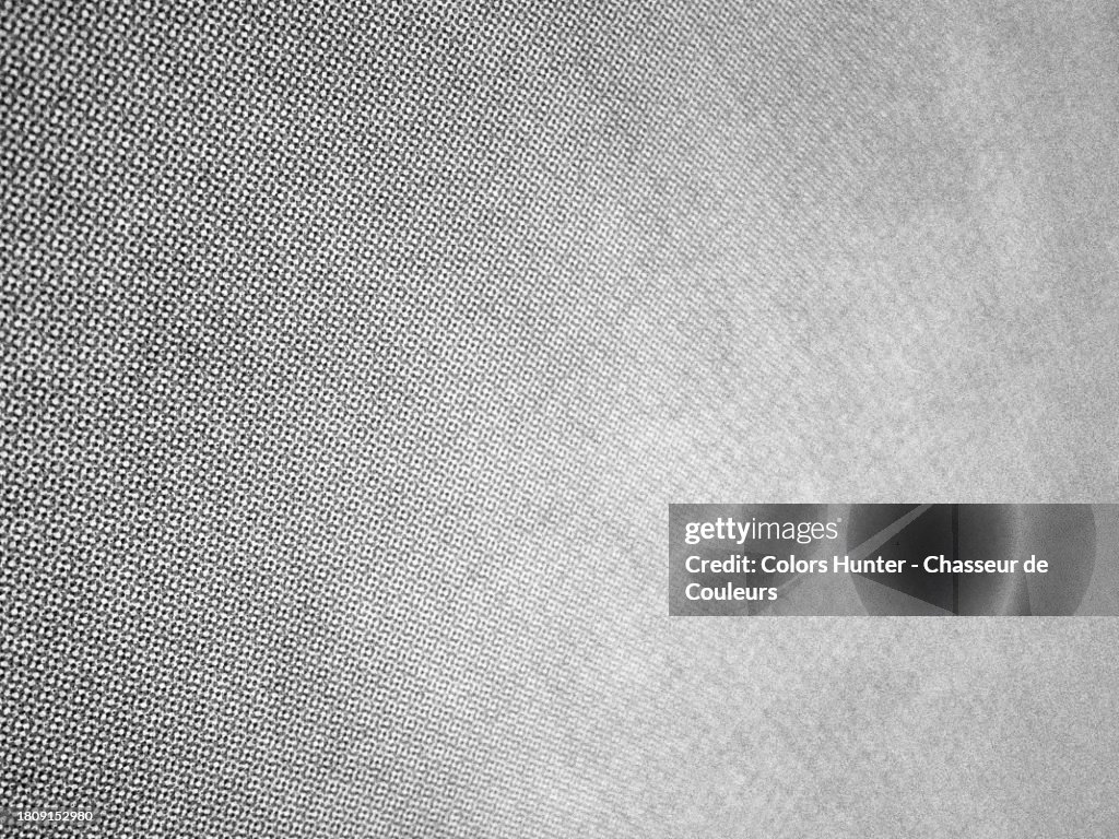 Black and white close-up with blur of dots printed on white paper in Paris, France