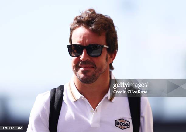 Fernando Alonso of Spain and Aston Martin F1 Team walks in the Paddock during previews ahead of the F1 Grand Prix of Abu Dhabi at Yas Marina Circuit...