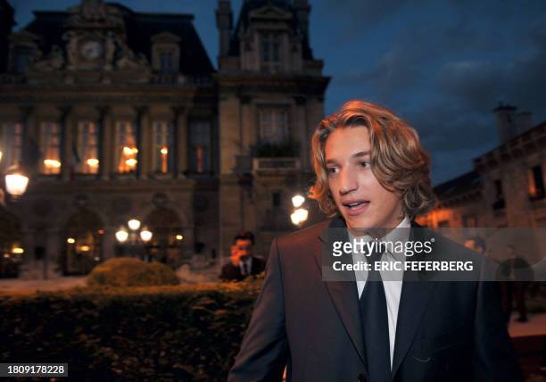 Jean Sarkozy, French President Nicolas Sarkozy's son talks with people in front of the city hall in Neuilly-sur-Seine, outside Paris, on September 10...