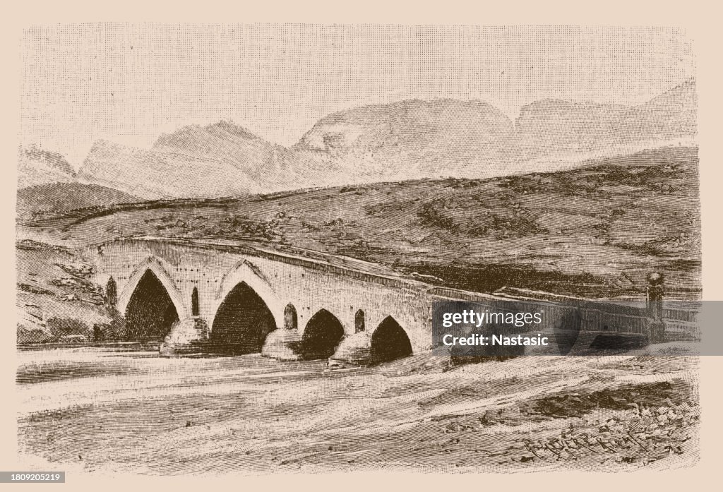 Persian bridge in the salt desert from the road from Rum to Tehran