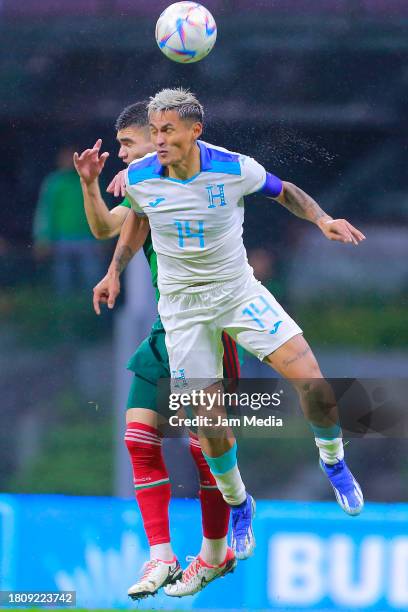 Johan Vazquez of Mexico fights for the ball with Andy Najar of Hondura during the CONCACAF Nations League quarterfinals second leg match between...