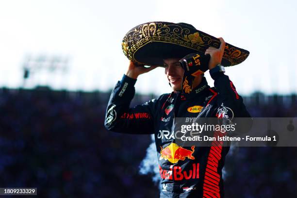 Race winner Max Verstappen of the Netherlands and Oracle Red Bull Racing celebrates on the podium after the F1 Grand Prix of Mexico at Autodromo...