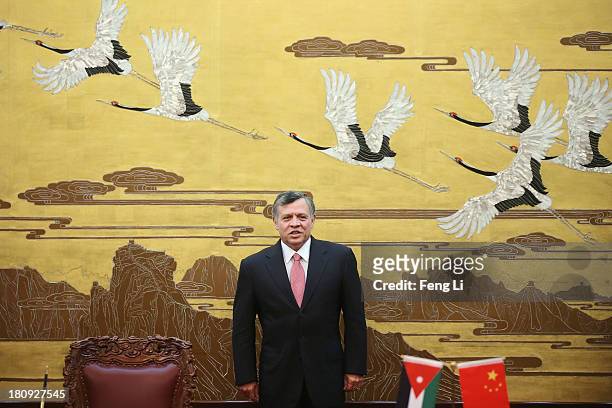 King Abdullah II bin Al Hussein of Jordan attends a signing ceremony with Chinese President Xi Jinping at the Great Hall of the People on September...