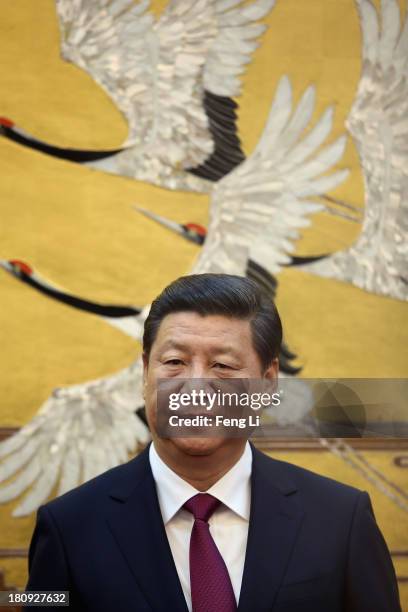 Chinese President Xi Jinping attends a signing ceremony with King Abdullah II bin Al Hussein of Jordan at the Great Hall of People on September 18,...