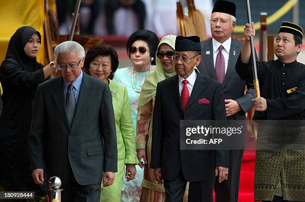 Singapore's President Tony Tan Keng Yam , his wife Mary Chee Bee Kiang , Malaysia's King Abdul Halim Mu'adzam Shah and his wife Tuanku Hajah Haminah...