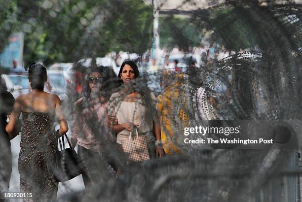 Barbed wire and debris still surround areas of Tunis, the capital of Tunisia a year and a half after former president Ben Ali was ousted by a popular...