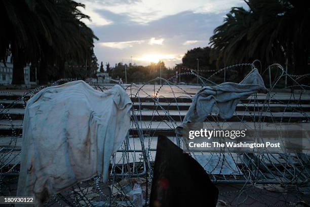 Barbed wire and debris still surround areas of Tunis, the capital of Tunisia a year and a half after former president Ben Ali was ousted by a popular...