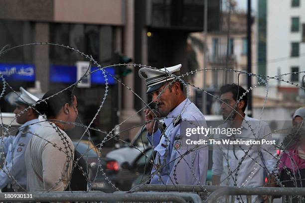 Barbed wire and debris still surround areas of Tunis, the capital of Tunisia a year and a half after former president Ben Ali was ousted by a popular...