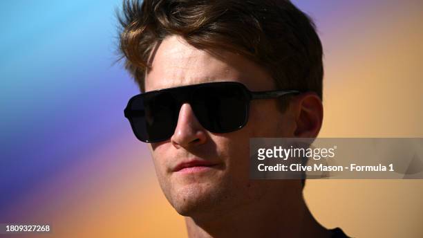 Logan Sargeant of United States and Williams walks in the Paddock during previews ahead of the F1 Grand Prix of Abu Dhabi at Yas Marina Circuit on...