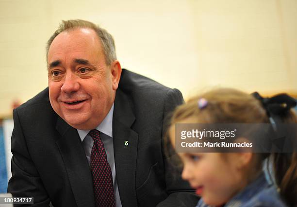 First Minister Alex Salmond talks to children during a visits to the North Edinburgh Childcare Centre to mark one year to go until the Scottish...