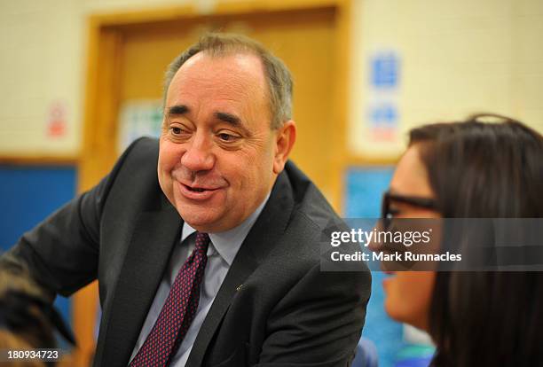 First Minister Alex Salmond talks to children during a visits to the North Edinburgh Childcare Centre to mark one year to go until the Scottish...