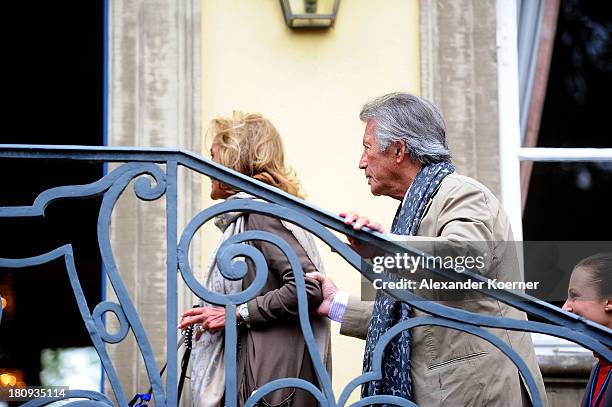 Actor Pierre Brice arrives with his wife Hella Krekel prior to a press conference with the Dalai Lama on September 18, 2013 in Hanover, Germany....