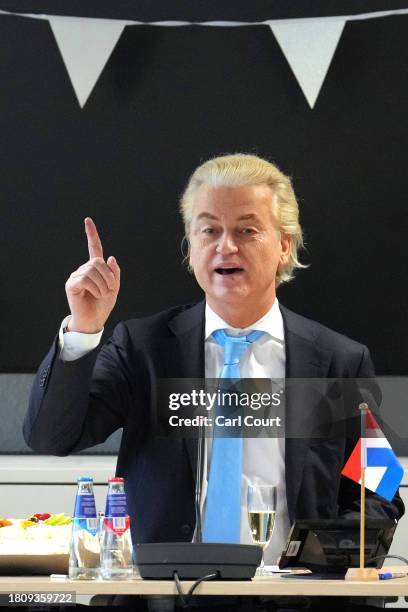 Geert Wilders, the leader of the Dutch Party for Freedom , sits next to Dutch MP Fleur Agema as he delivers a speech at a post-election meeting at...