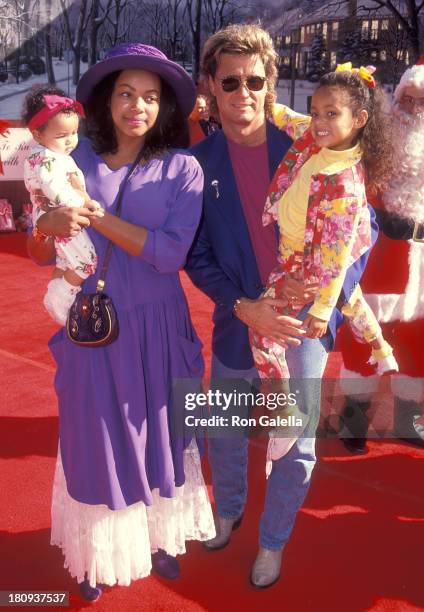 Radio personality Shadoe Stevens, wife Beverly Cunningham and daughters Chyna and Amber attend Michael Bass' First Annual Holiday Party to Benefit...