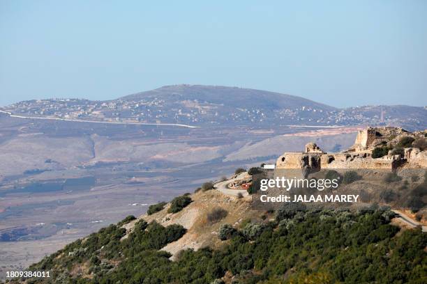 Picture taken on November 29 shows the Nimrod Castle in the Israeli-annexed Golan Heights, with Lebanese villages in the background separated by a...