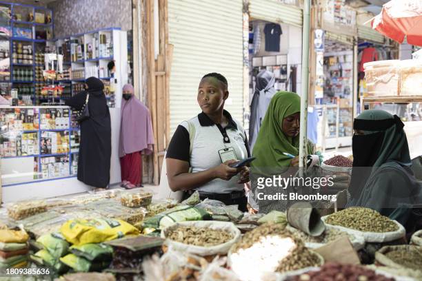 Kenya Revenue Authority tax agents visit a street vendor in the Eastleigh district of Nairobi, Kenya, on Thursday, Oct. 19, 2023. Deploying 1,400 tax...