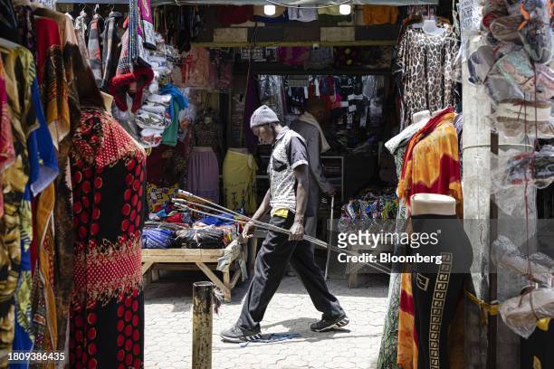 Stores line a pedestrianized street in the Eastleigh district of Nairobi, Kenya, on Thursday, Oct. 19, 2023. Deploying 1,400 tax collectors is the...