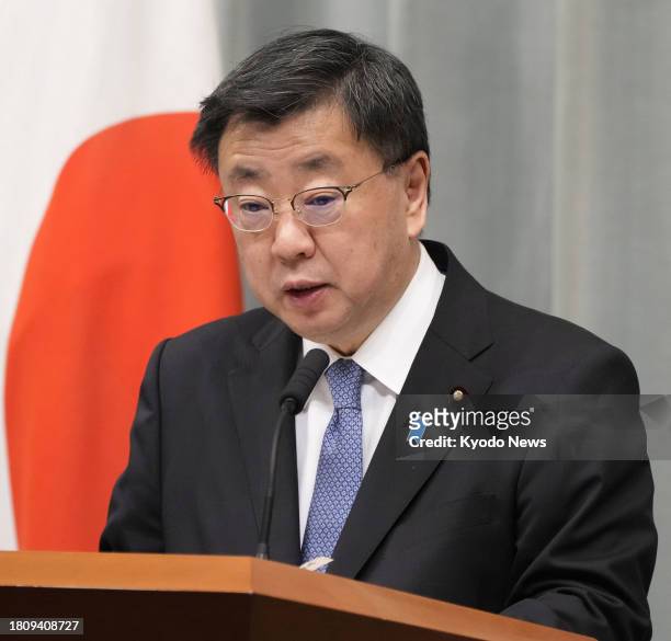 Japanese Chief Cabinet Secretary Hirokazu Matsuno speaks at a press conference in Tokyo on Nov. 29 after a U.S. Military Osprey aircraft carrying...