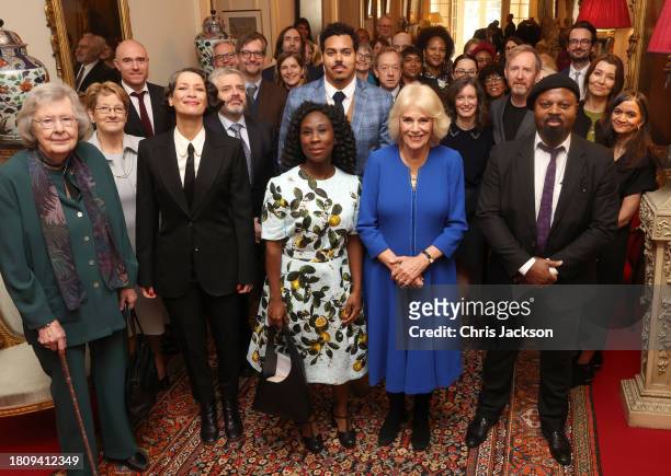 Queen Camilla poses with Sir Ben Okri , Gaby Wood, Director of the Booker Prize Foundation , Esi Edugyan, chair of the 2023 Booker Prize judges ,...
