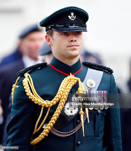 Major Oliver 'Ollie' Plunket accompanies Queen Camilla as she visits the 95th Field of Remembrance at Westminster Abbey on November 9, 2023 in...