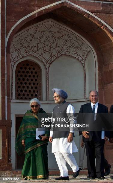 Indian Prime Minister Manmohan Singh leaves after the inauguration ceremony as Chairman of the Aga Khan Development Network, Aga Khan and Union...