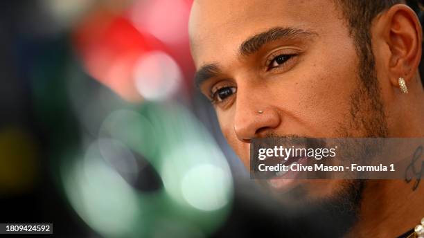 Lewis Hamilton of Great Britain and Mercedes talks to the media in the Paddock during previews ahead of the F1 Grand Prix of Abu Dhabi at Yas Marina...