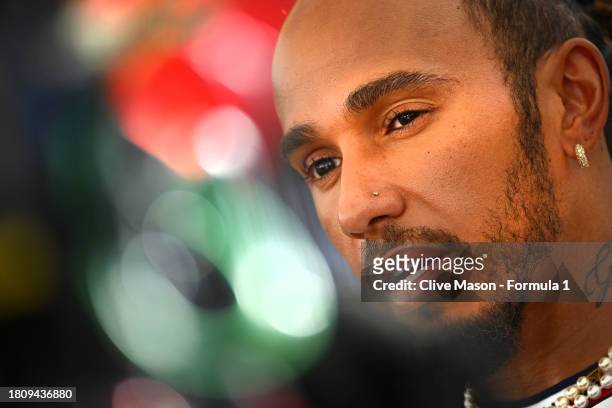 Lewis Hamilton of Great Britain and Mercedes talks to the media in the Paddock during previews ahead of the F1 Grand Prix of Abu Dhabi at Yas Marina...
