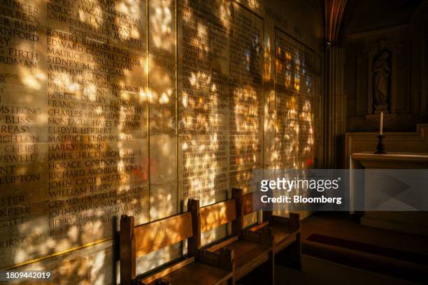 Reflections from stained-glass windows on a wall at King's College Chapel at Cambridge University in Cambridge, UK, on Tuesday, Nov. 28, 2023. The...