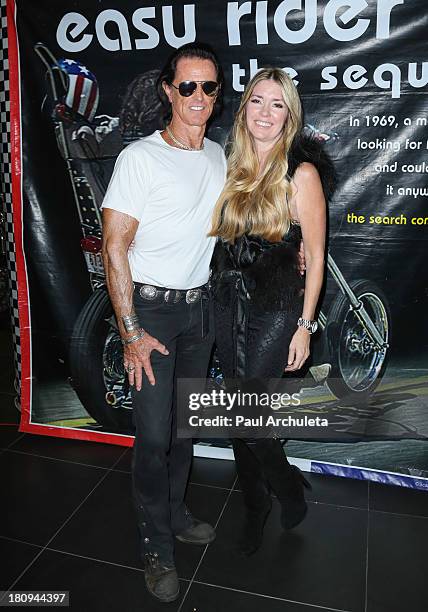 Writer Phil Pitzer and Actress Jodie Fisher attend the screening of Easy Rider The Ride Back "Ride-In" at Bartels' Harley-Davidson on September 17,...